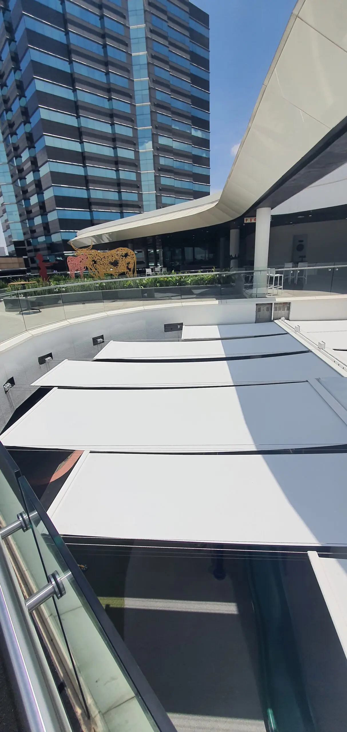Merchant Place, South Africa, Retail Centre, Shading Solution, Innovative Solution, Guthrie Douglas Group, TESS™ 440, Solar Shading, Innovation. Global Shading Solutions. Tensioned Blinds, Solar Shading